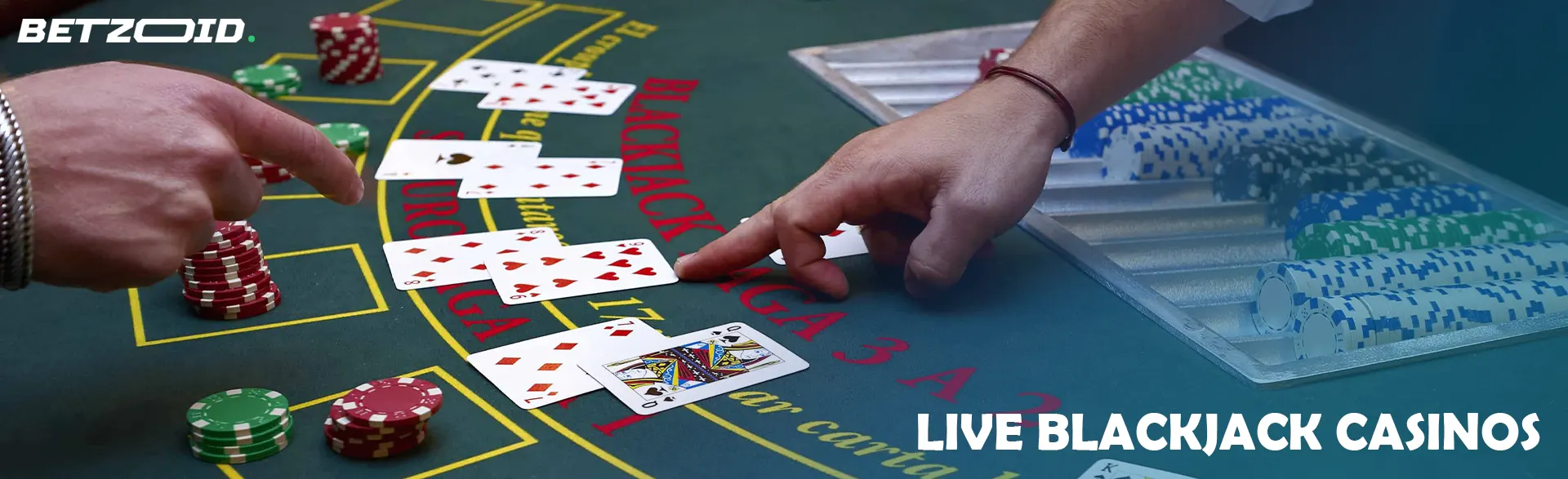 The player points to the cards on the blackjack table.