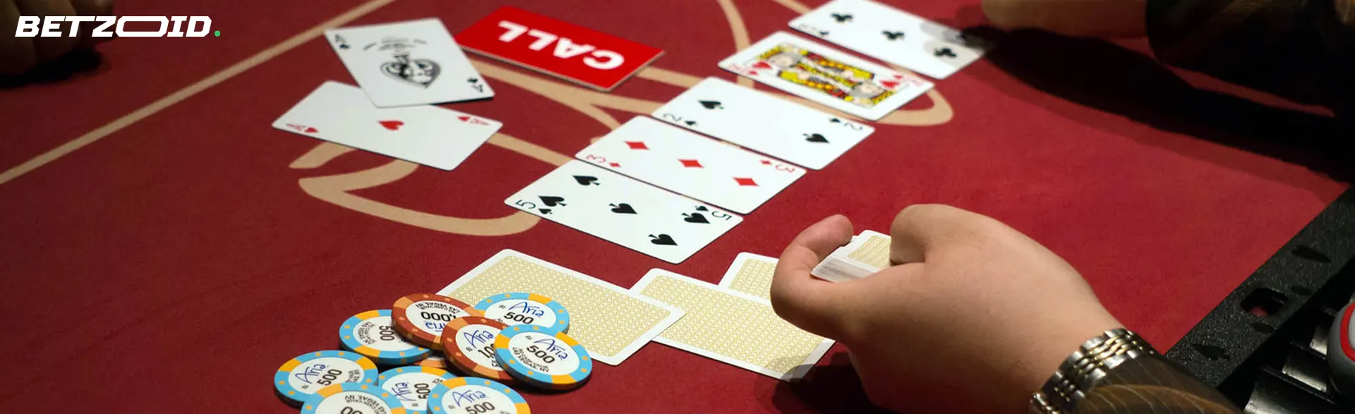The player lays out the cards on the poker table.