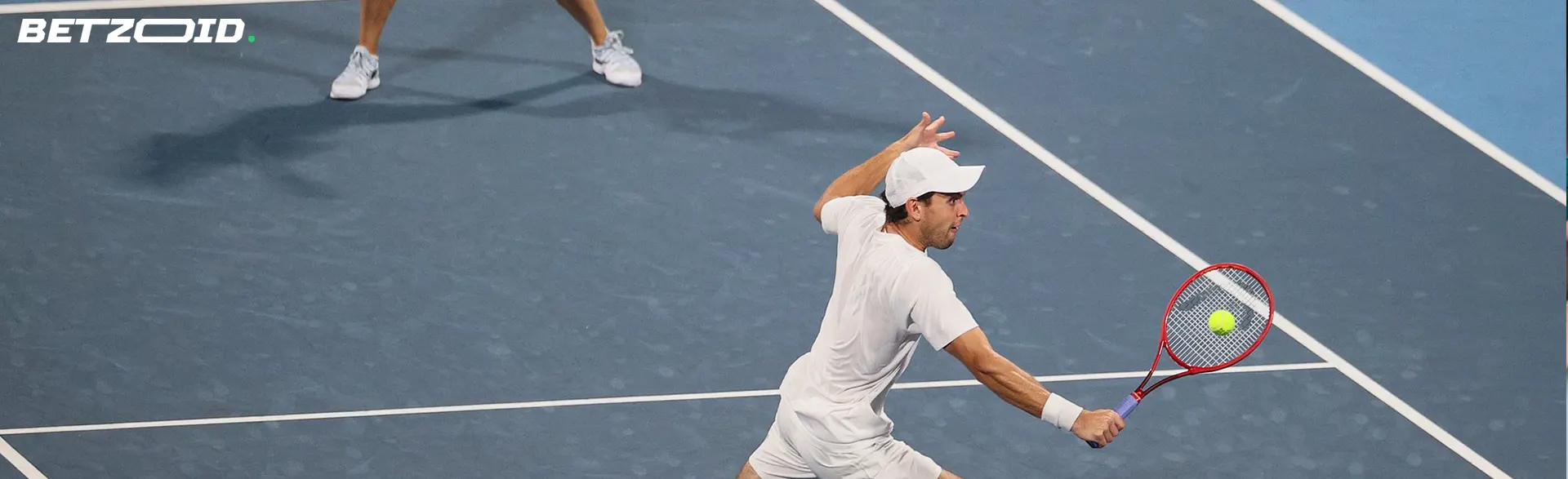 Tennis players in action during the game.