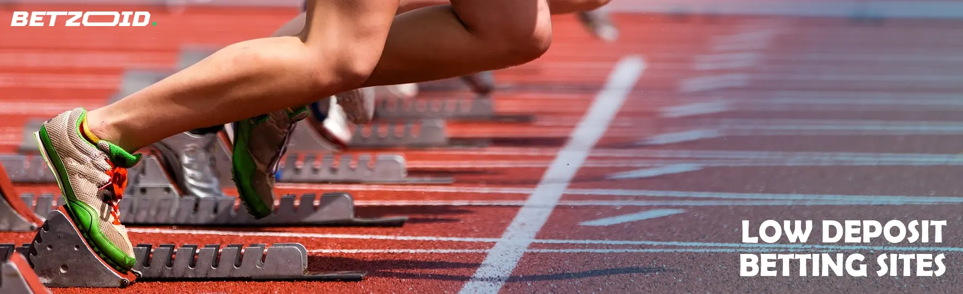 Runners start on the track.