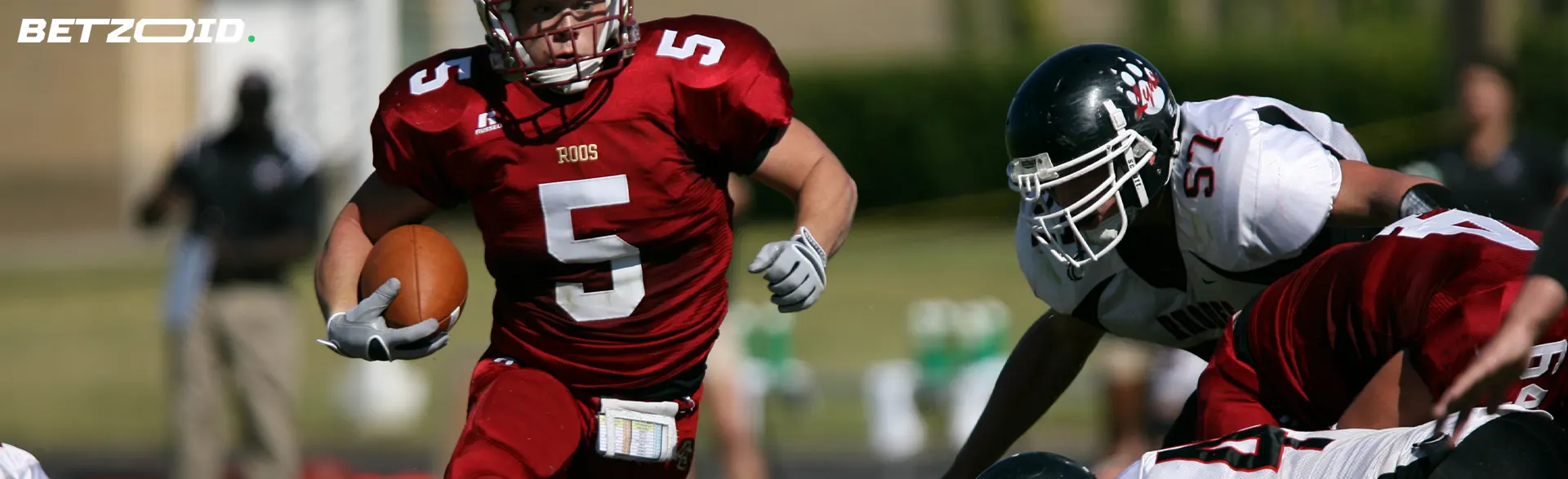 American football players in a dynamic game.
