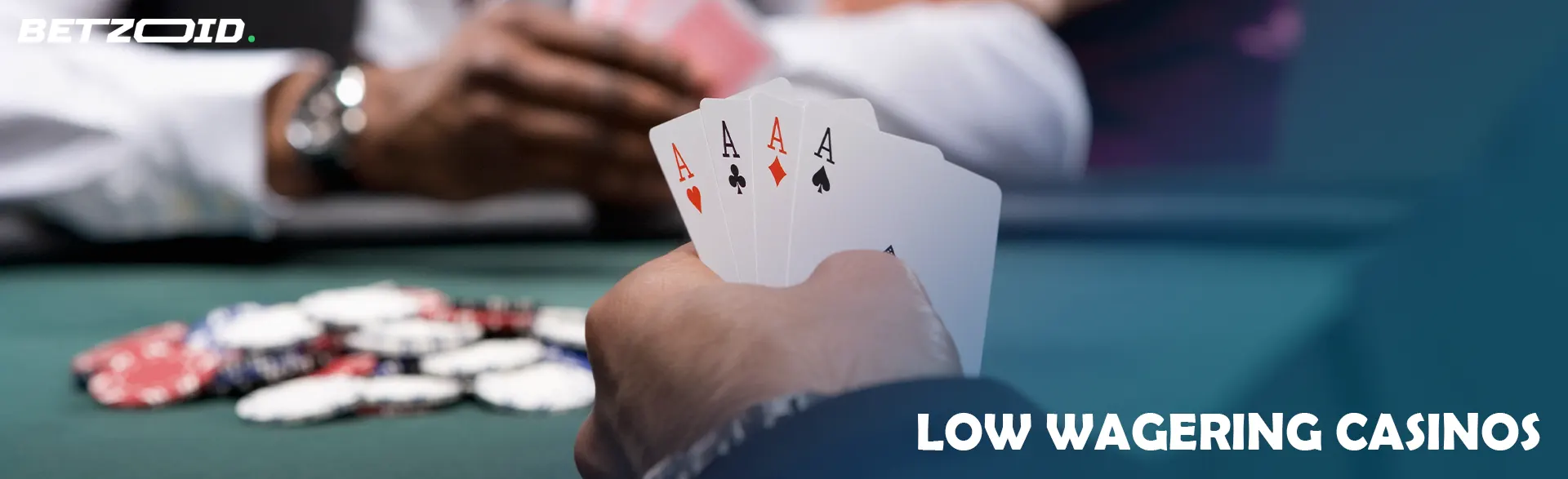 The player holds the cards on the background of a pile of chips.