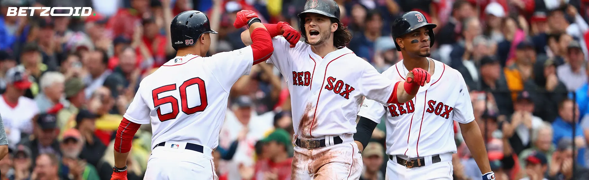 Baseball players greet each other before the game.