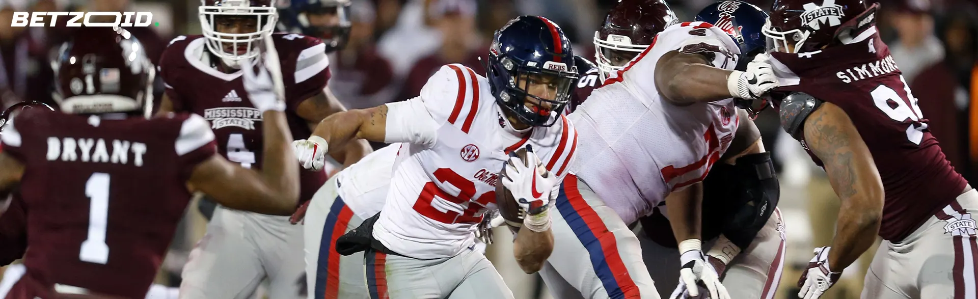 American football players in action during a match.