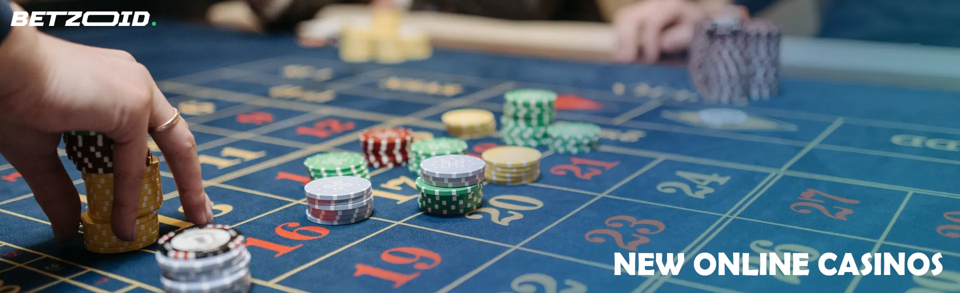 The player places chips on the casino table.