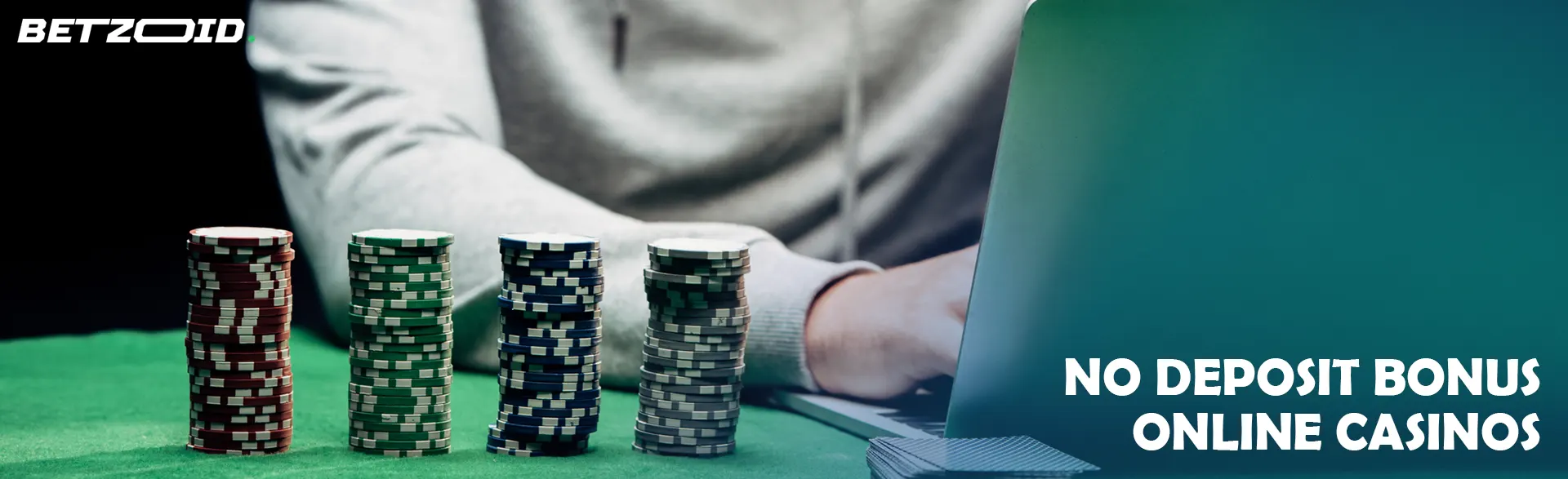 The player behind the laptop next to the chips.