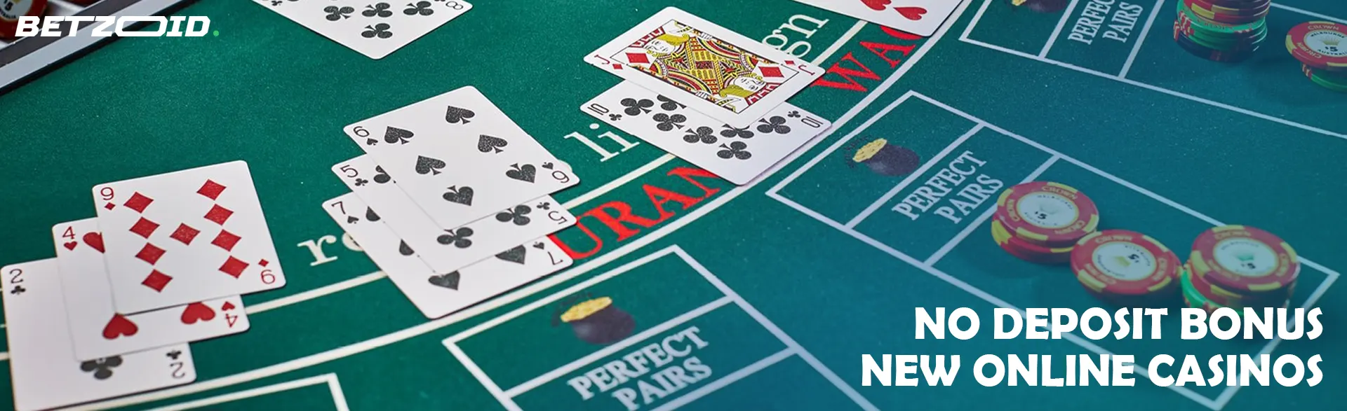 Cards and chips on the casino table.