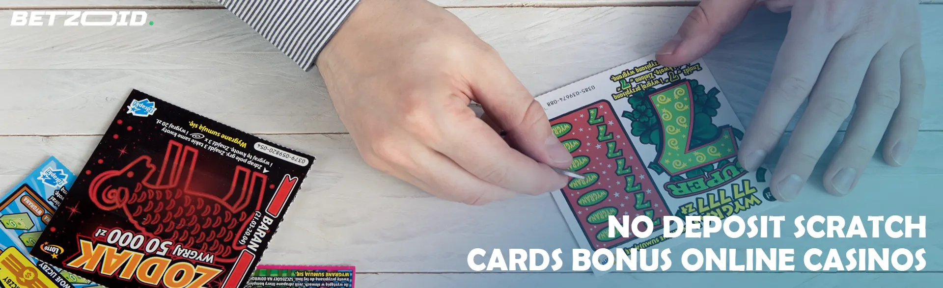 A person erases a scratch card.