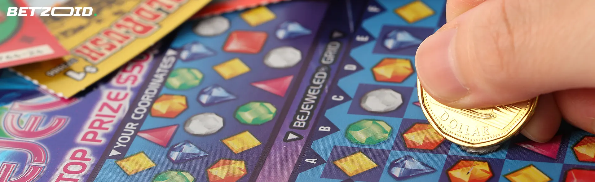 A person erases a scratch card.