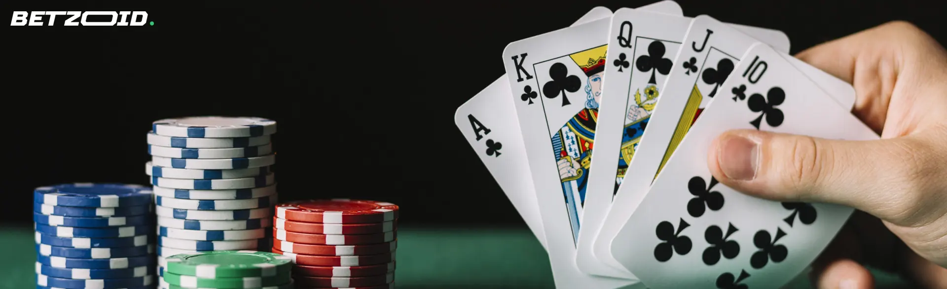 The cards are in the hands of the player next to the casino chips.