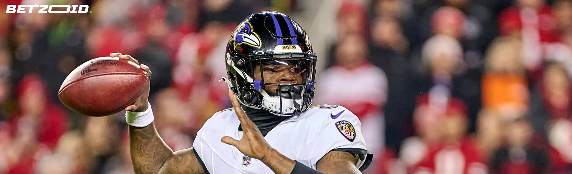 Football player in action during a game, highlighting Nunavut online betting sites.