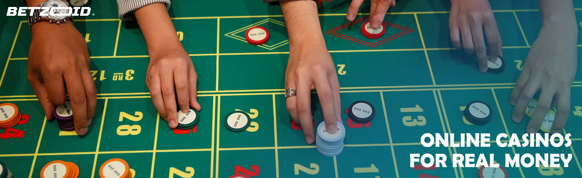 Players place bets on the casino table.