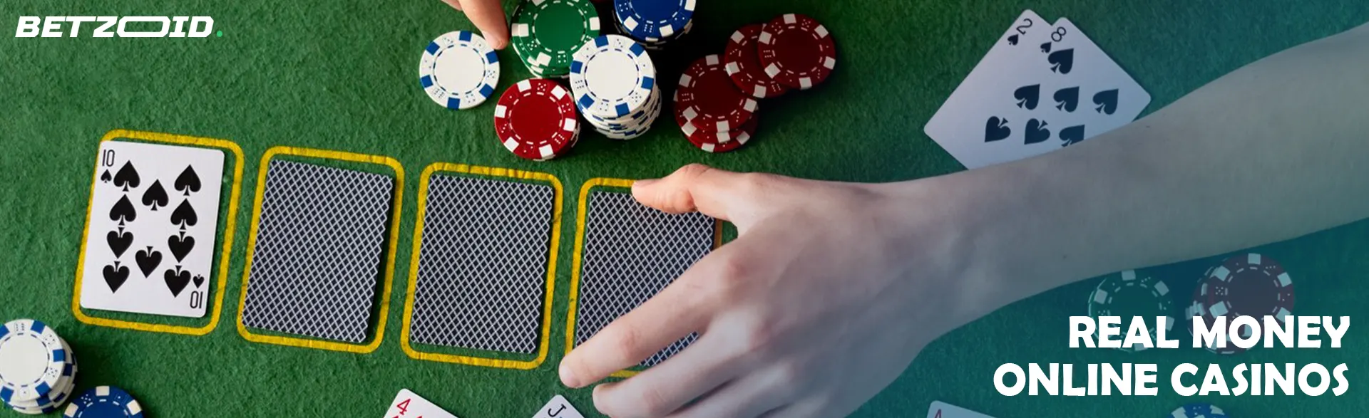 The player draws cards on the casino table.