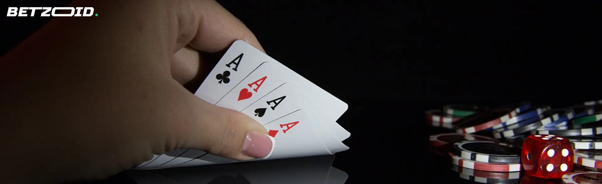 The player holds cards next to dice and casino chips.