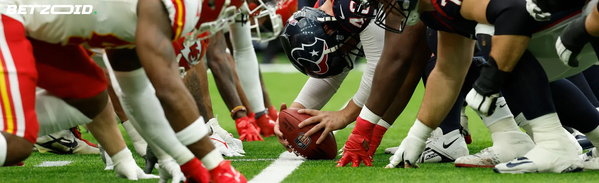A close-up of a football game, representing online sportsbooks in Quebec.