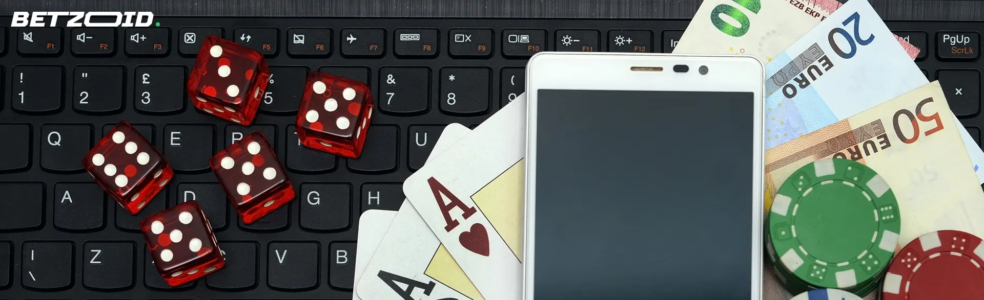 Smartphone, banconote e fiches da poker per la ricarica del credito telefonico nei giochi da casinò.