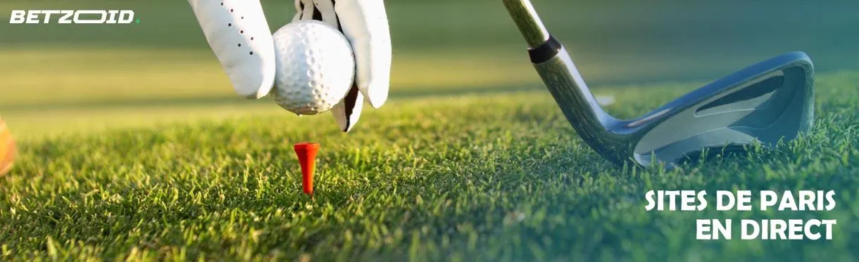 Un golfeur se prépare à réaliser un coup en posant la balle.