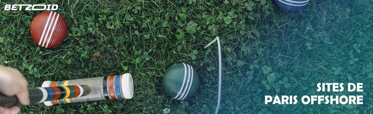 Une partie de croquet sur la pelouse verte.