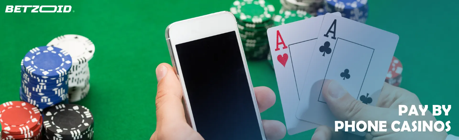 Phone and cards in the hands of a person on the background of casino chips.