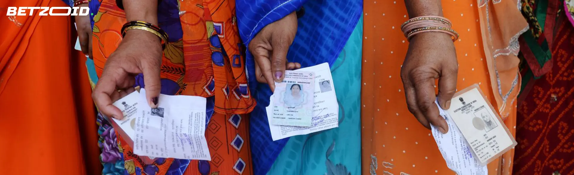 People hold papers to vote.