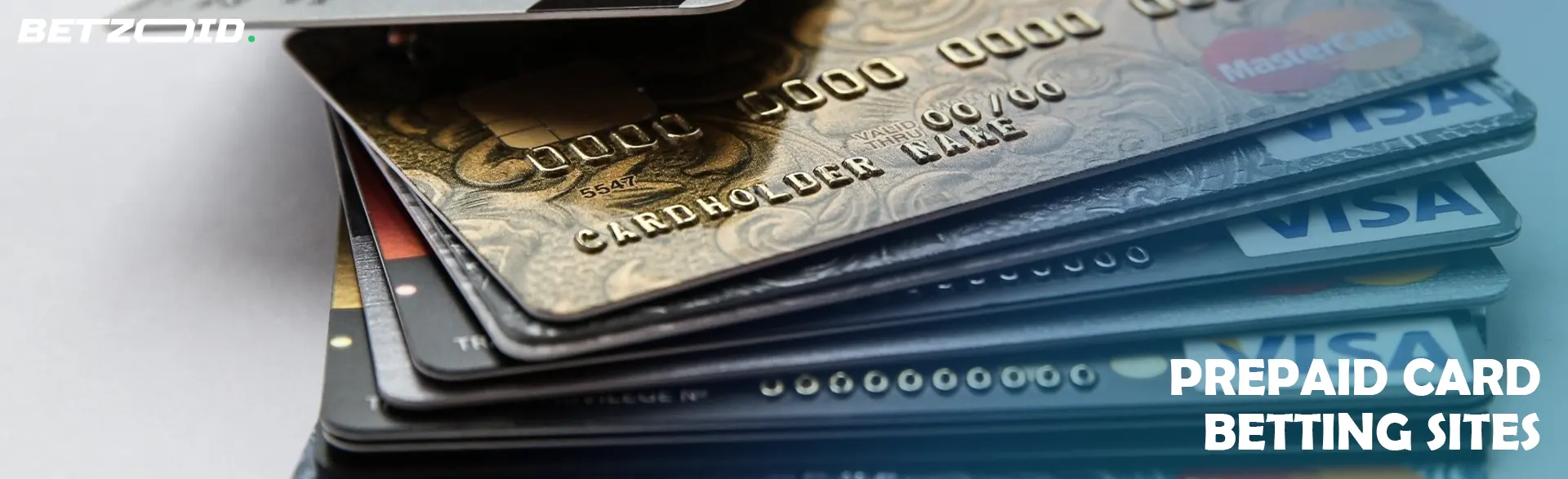 A pile of bank cards of different brands.