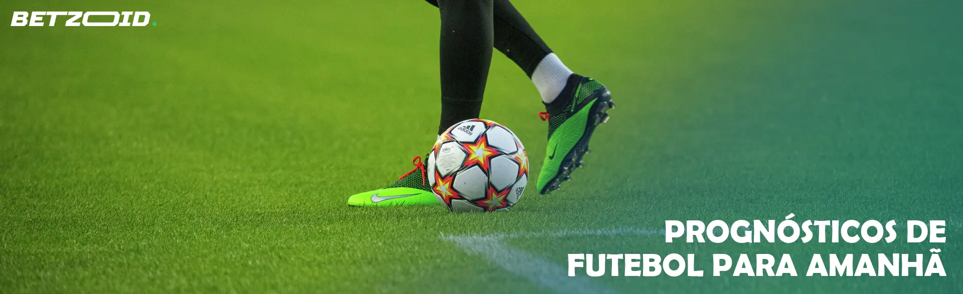 Pernas de um jogador de futebol com uma bola.