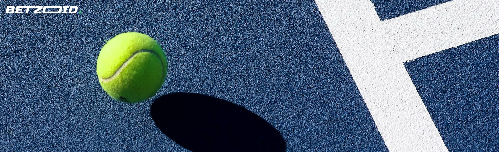 A tennis ball bounces across the court.