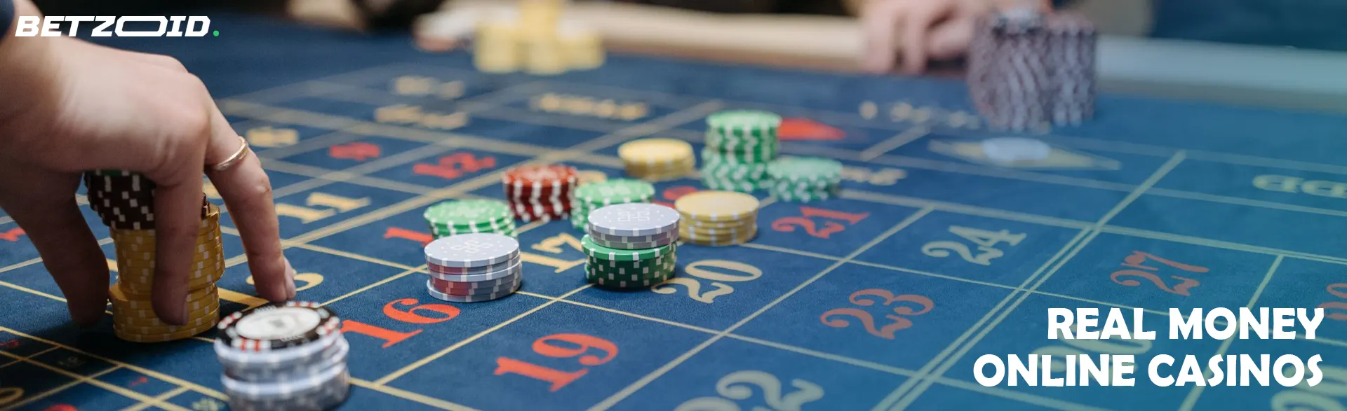 Players place chips on the casino table.