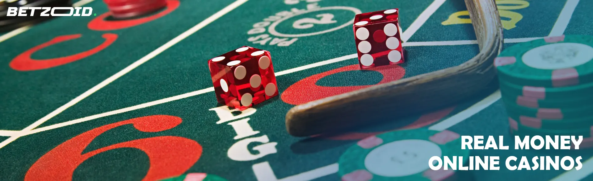 Red dice lying on the casino table.