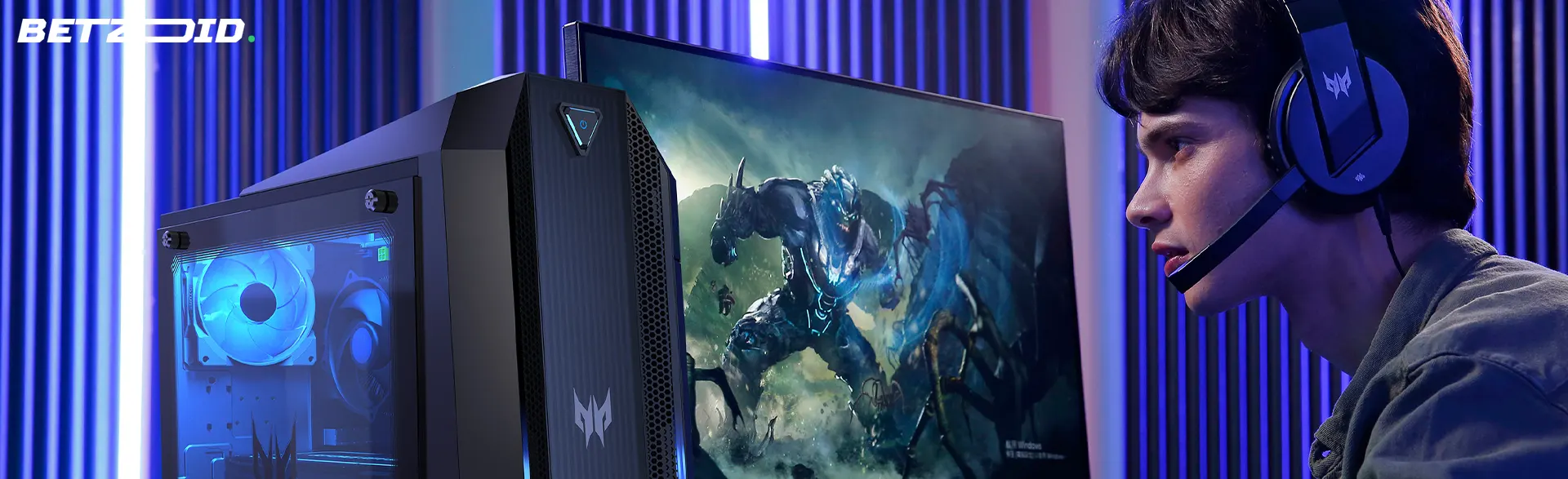 Gamer com fones de ouvido perto do computador.