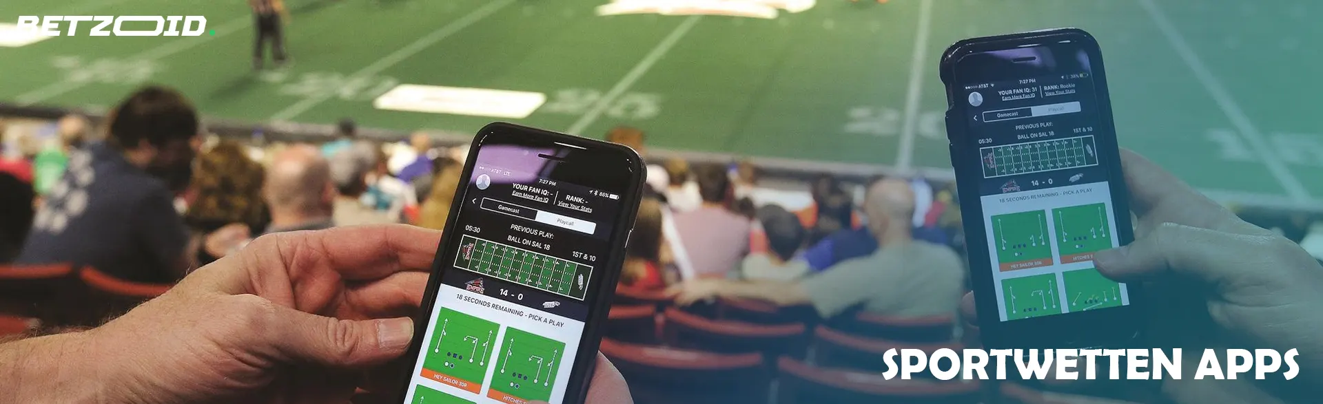 Auf der Tribüne halten Menschen Smartphones mit Wetten in der Hand.