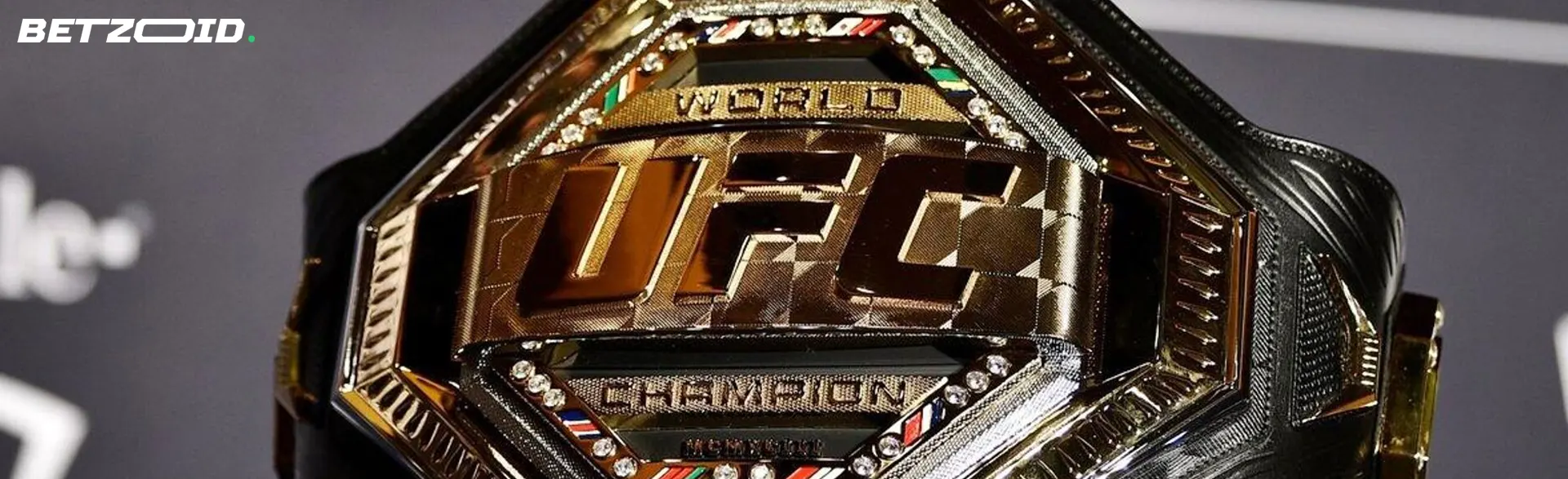 UFC championship belt with gold elements.