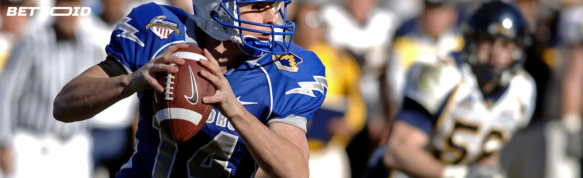 American football player in action during a match.