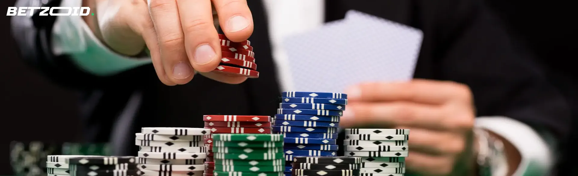 El jugador coloca las fichas delante de él.