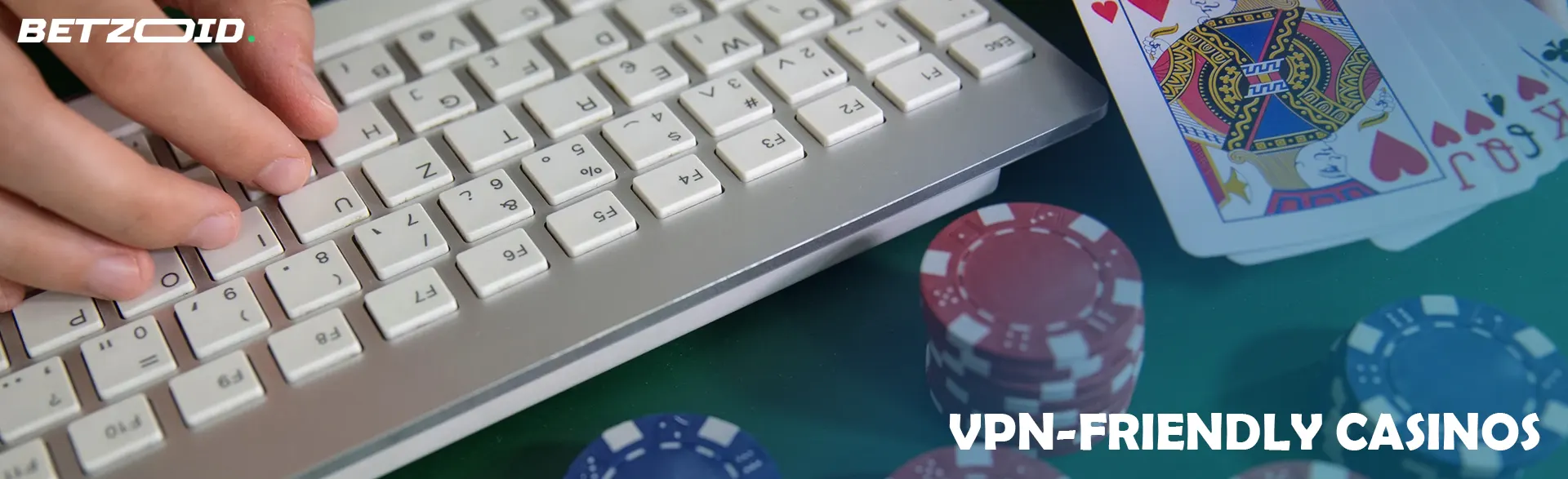 Cards and chips next to the keyboard.