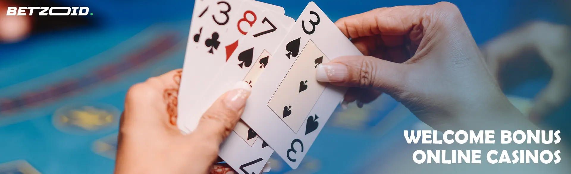 The player holds playing cards in his hand.